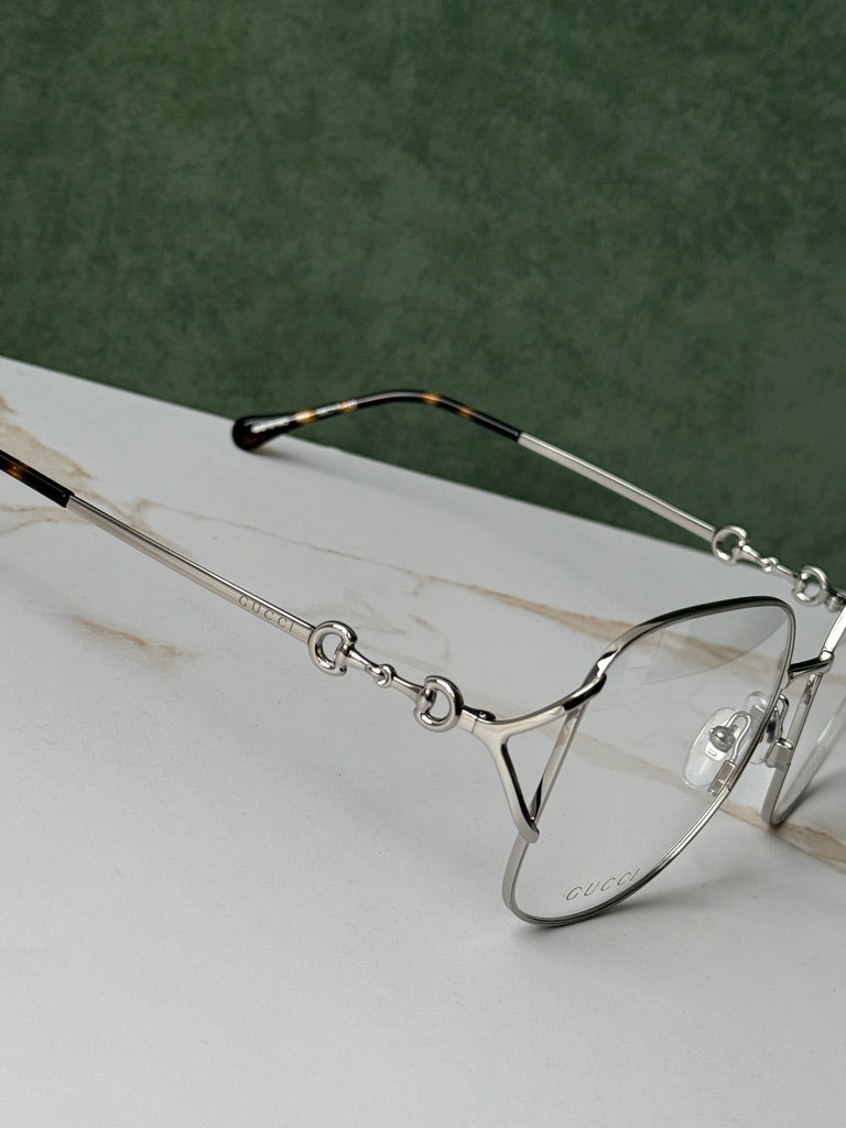 Gucci GG0973O Marcos de metal plateado
