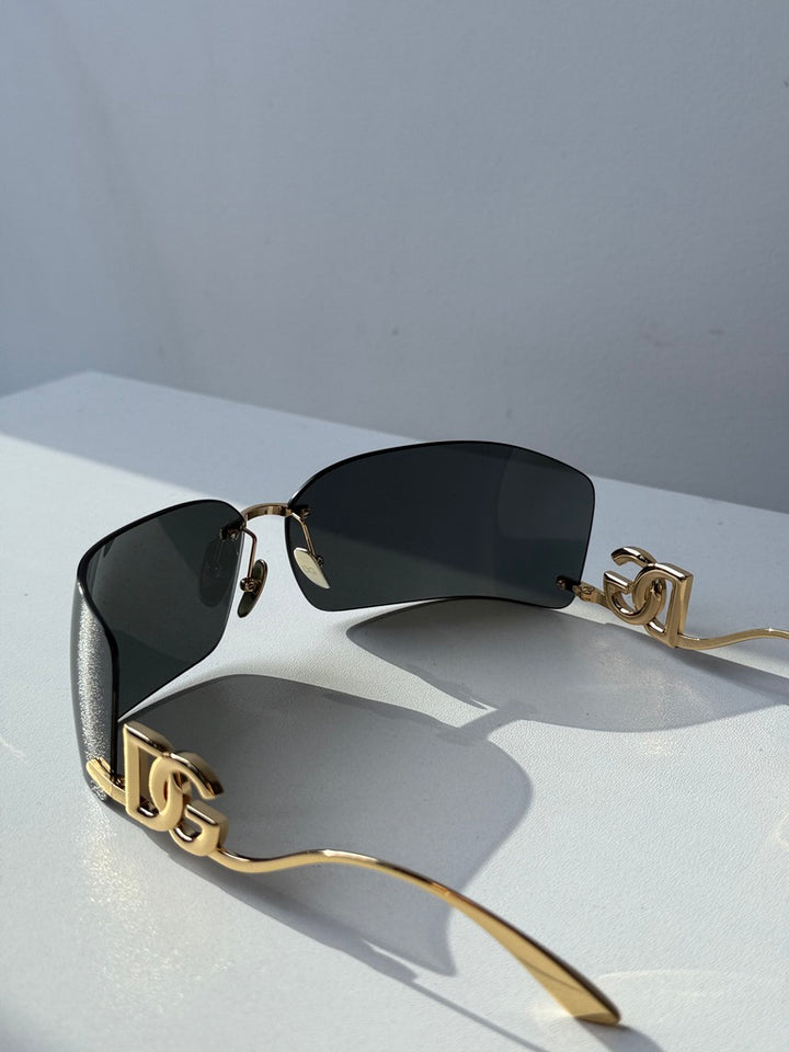 Dolce &amp; Gabbana DG2298B Gafas de sol con escudo negro cristalino 