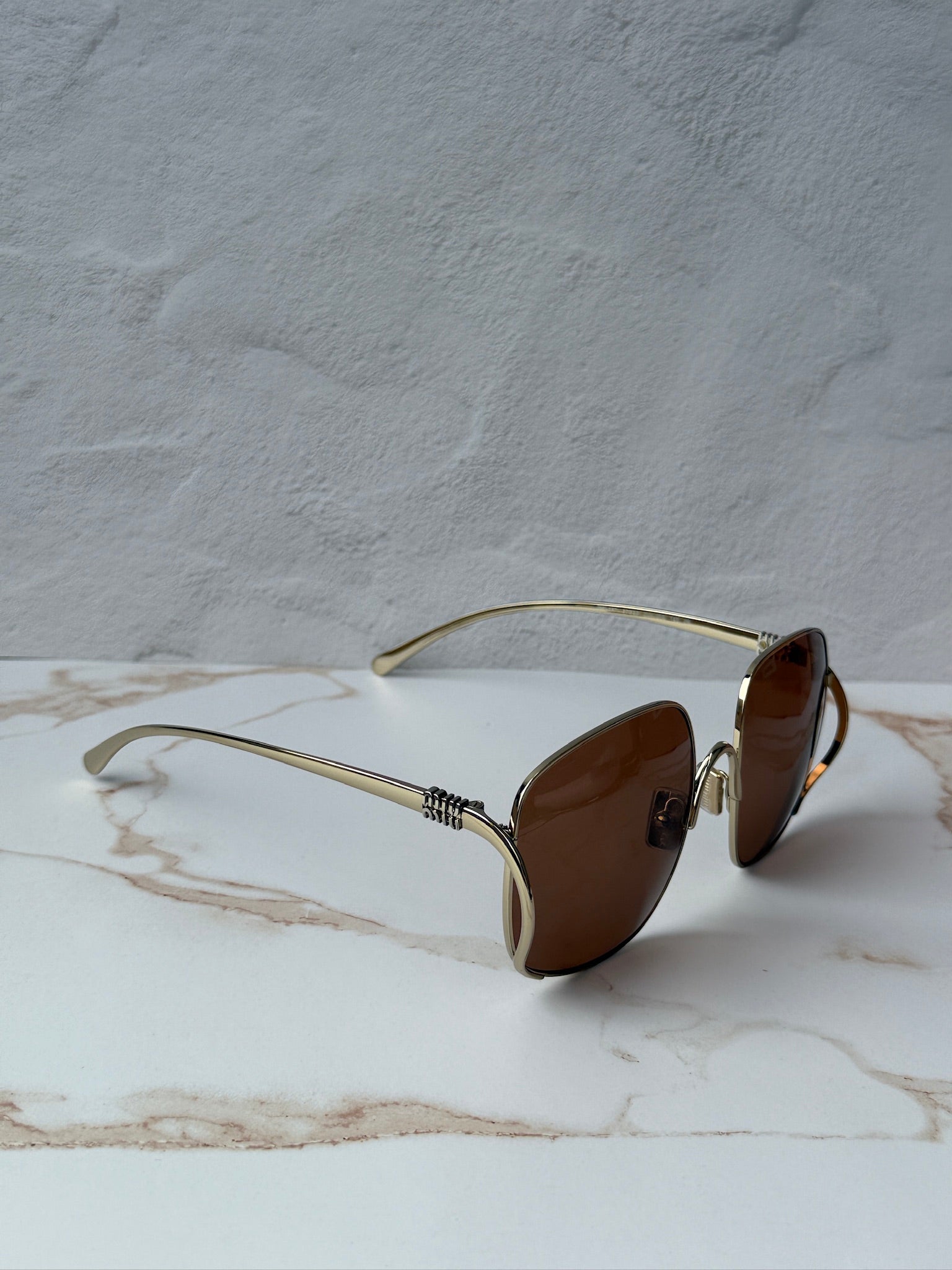Miu Miu MU A57S Gold Brown Oversized Round | Designer Daydream