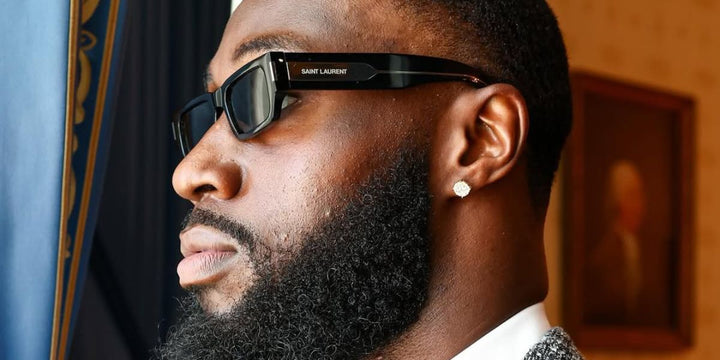 Saint Laurent SL660/F black sunglasses on a man, dark rectangular lenses