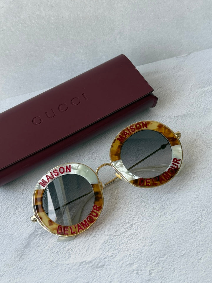 Gucci GG0113S Blind For Love Gafas de sol redondas negras