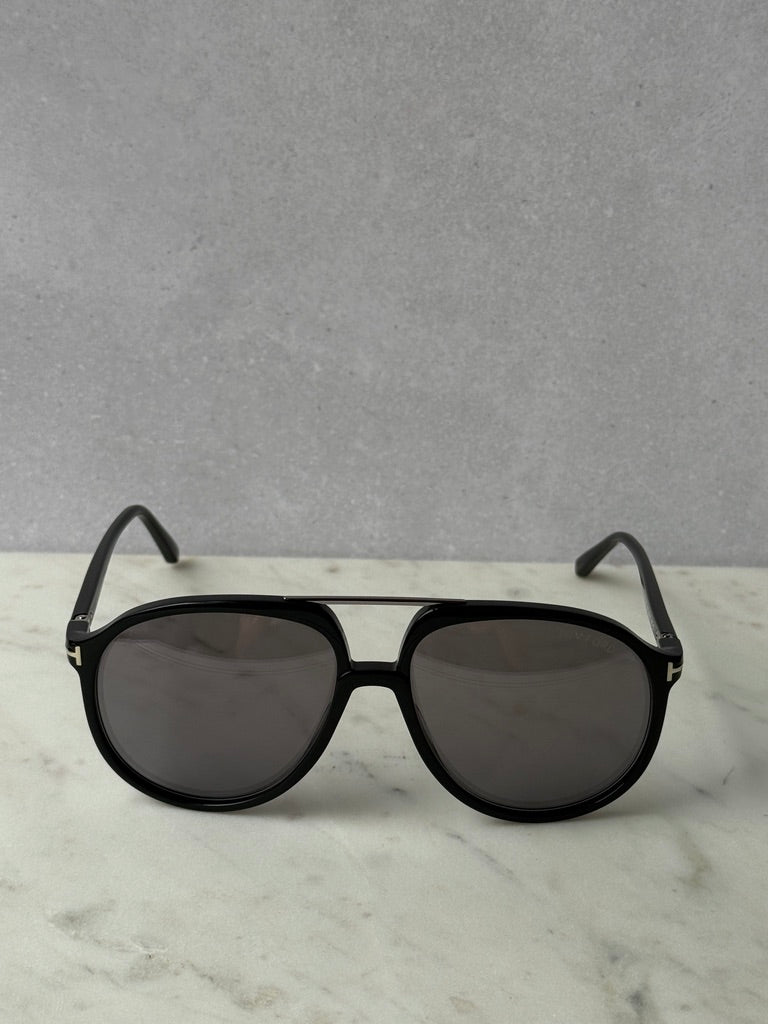 Black oversized aviator sunglasses with dark lenses, front view
