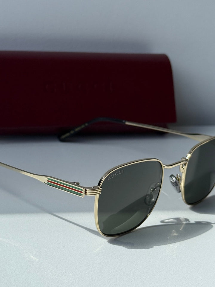 Gucci GG1876S Metal Sunglasses in Gold Grey
