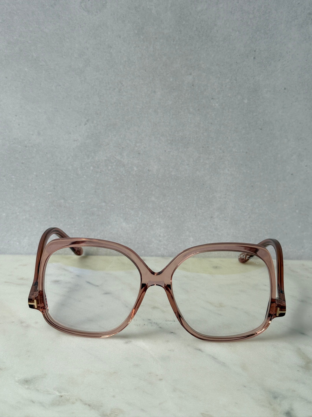 Pink oversized blue-light glasses frames, front view with clear lenses