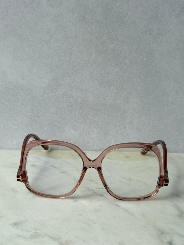 Pink oversized blue-light glasses frames, front view with clear lenses