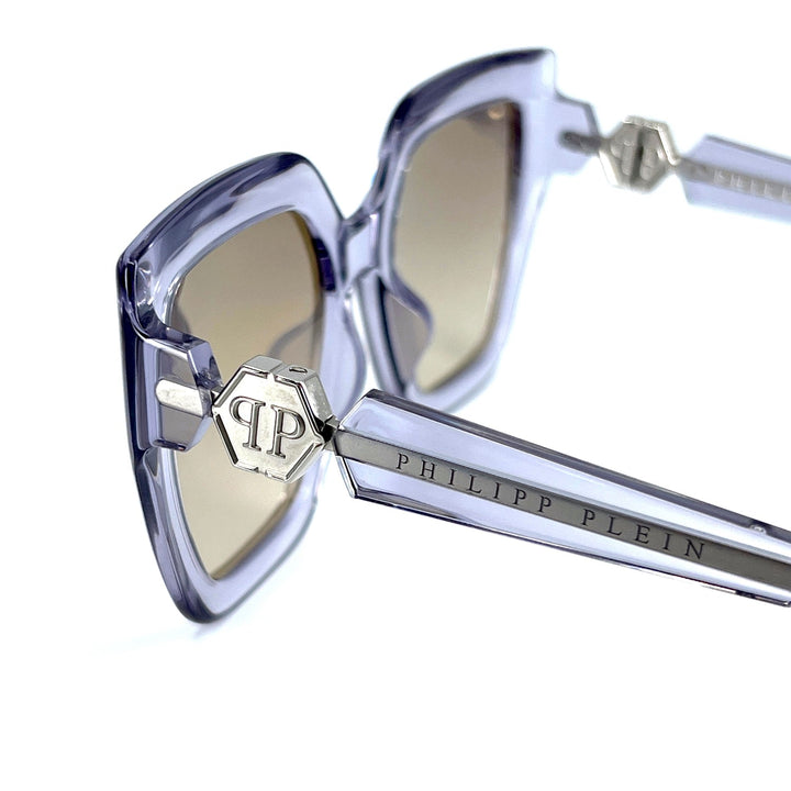Transparent lilac sunglasses with metal temple logo detailing and square frame corners