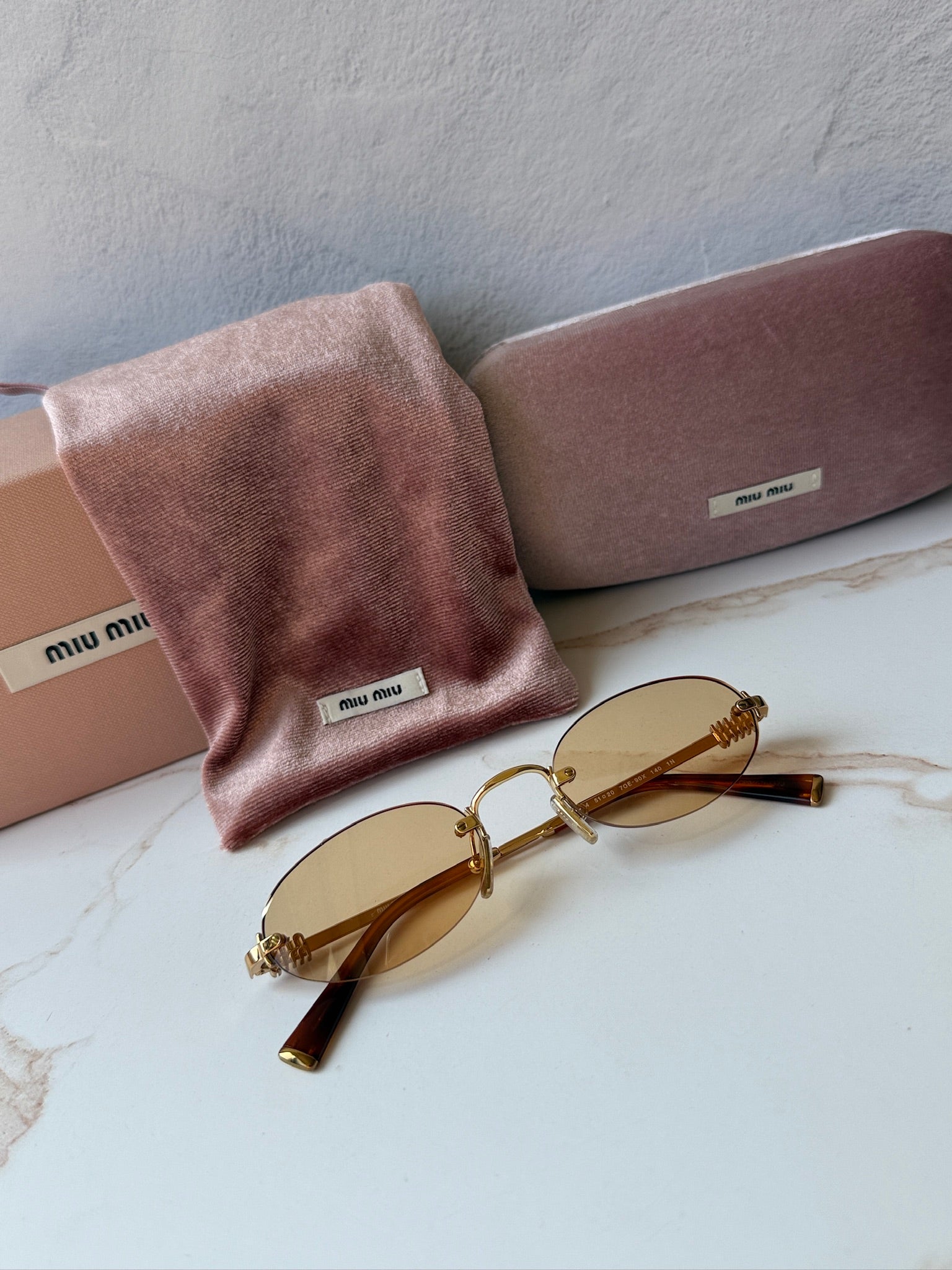 Miu Miu MU A54S Brass Orange Oval Rimless | Designer Daydream