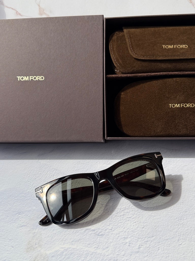 Square clip-on sunglasses with dark Havana-brown frames and tinted lenses