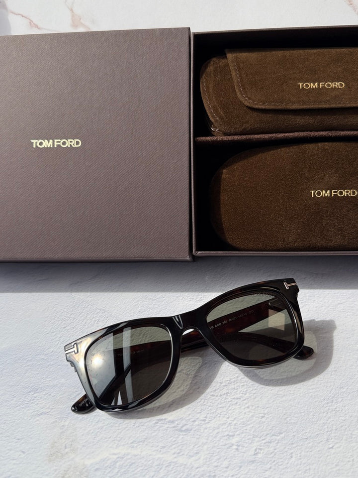 Square clip-on sunglasses with dark Havana-brown frames and tinted lenses