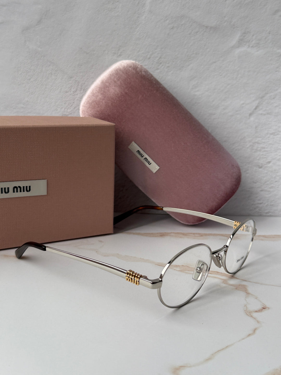 Miu Miu MU50ZV Silver Oval Eyeglasses Frames