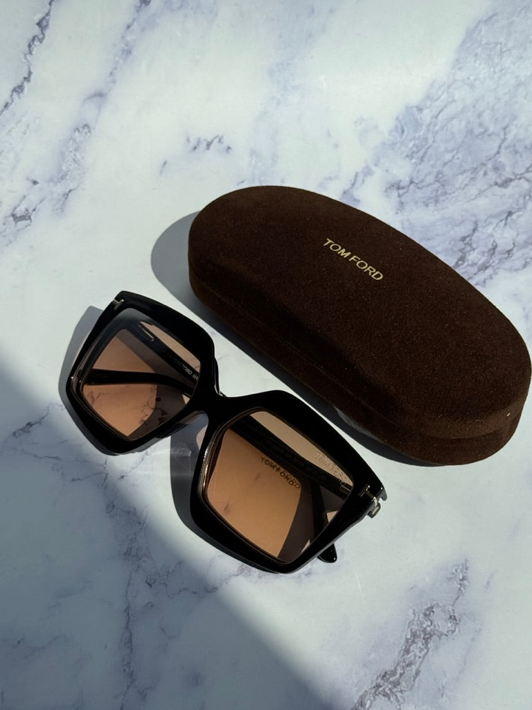 Tom Ford black clip-on sunglasses with black case, square frames and tinted lenses