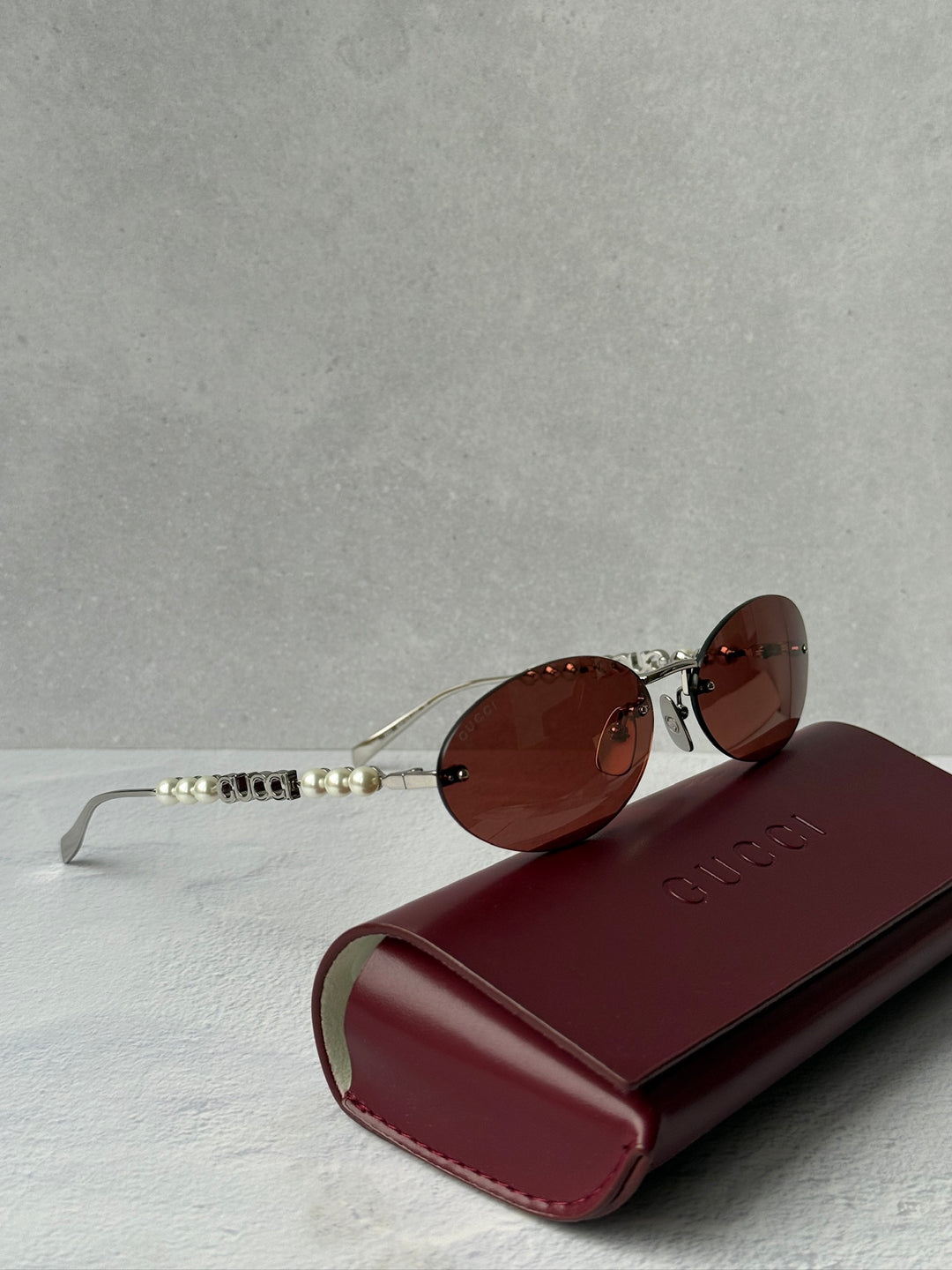 Gucci GG1922S Rimless Oval Pearl Sunglasses in Silver Red