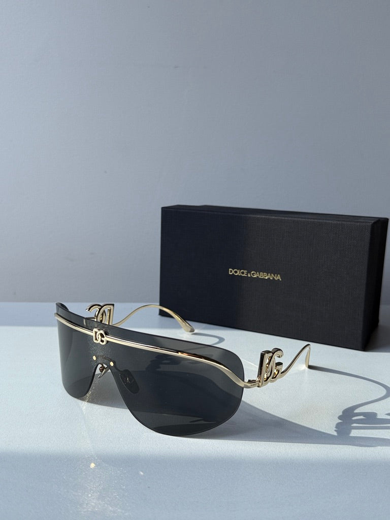 Dolce &amp; Gabbana DG2298B Gafas de sol con escudo negro cristalino 