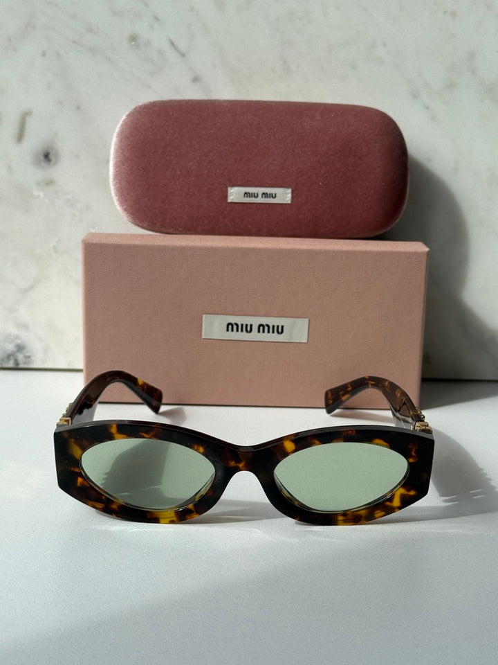 Miu Miu MU11WS Honey Havana Oval Sunglasses
