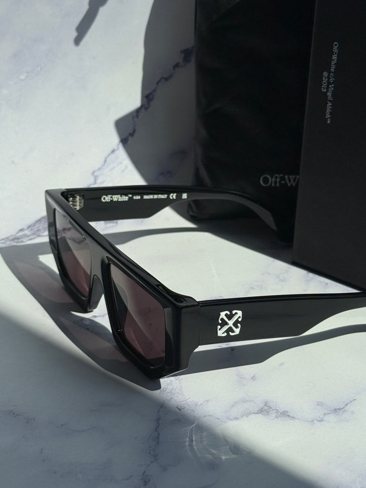 Off-White black square sunglasses with dark lenses, close angled