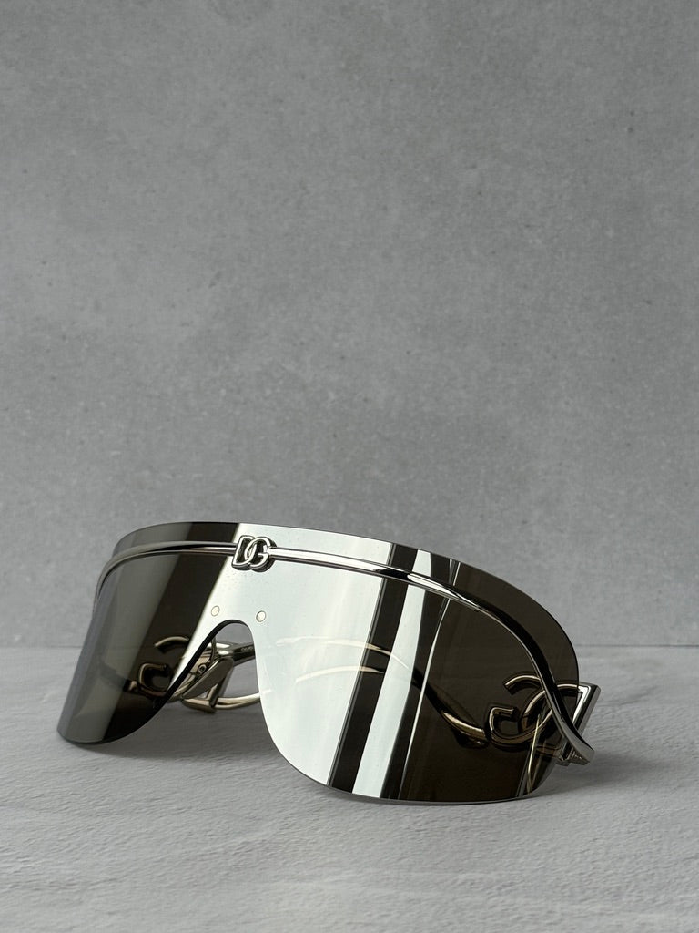 Dolce &amp; Gabbana DG2298B Gafas de sol con escudo negro cristalino 