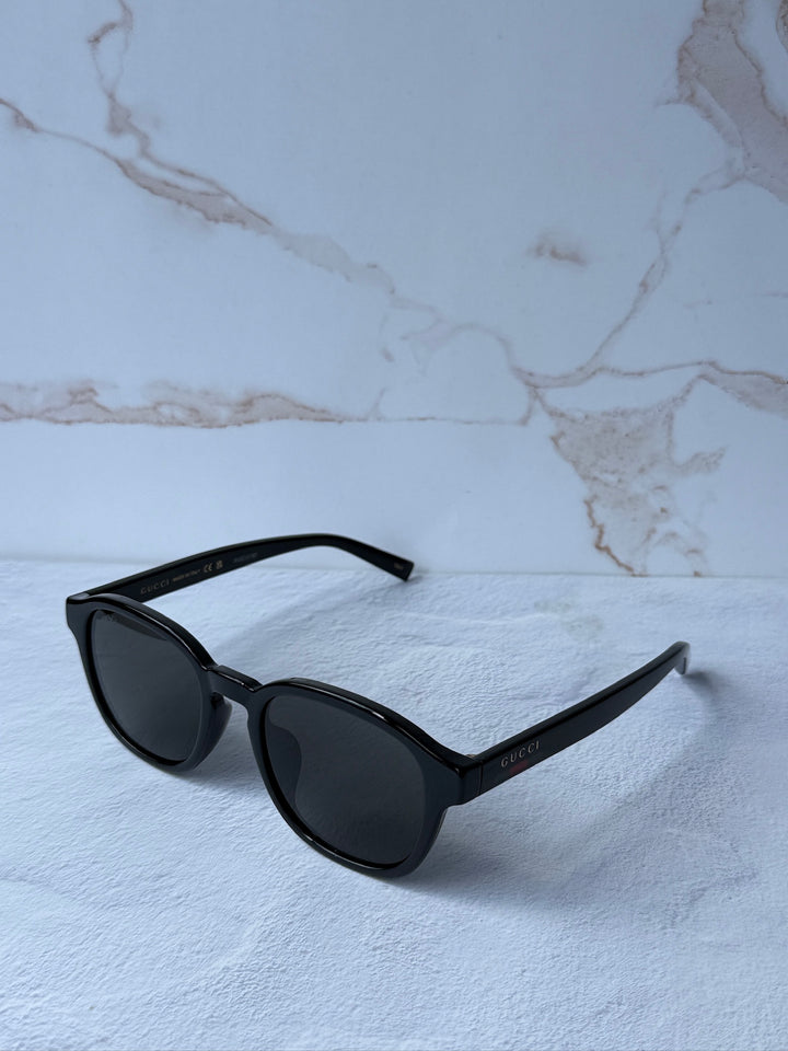 Gucci GG0003SN Gafas de sol cuadradas con patas a rayas