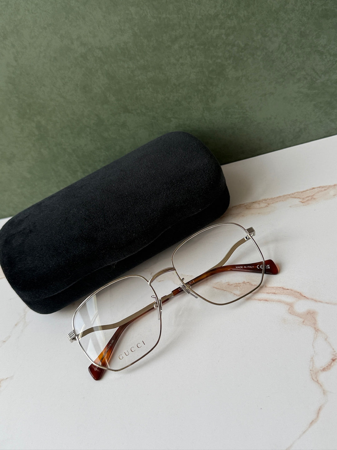 Gucci GG0973O Marcos de metal plateado