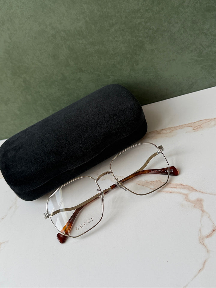 Gucci GG0973O Marcos de metal plateado