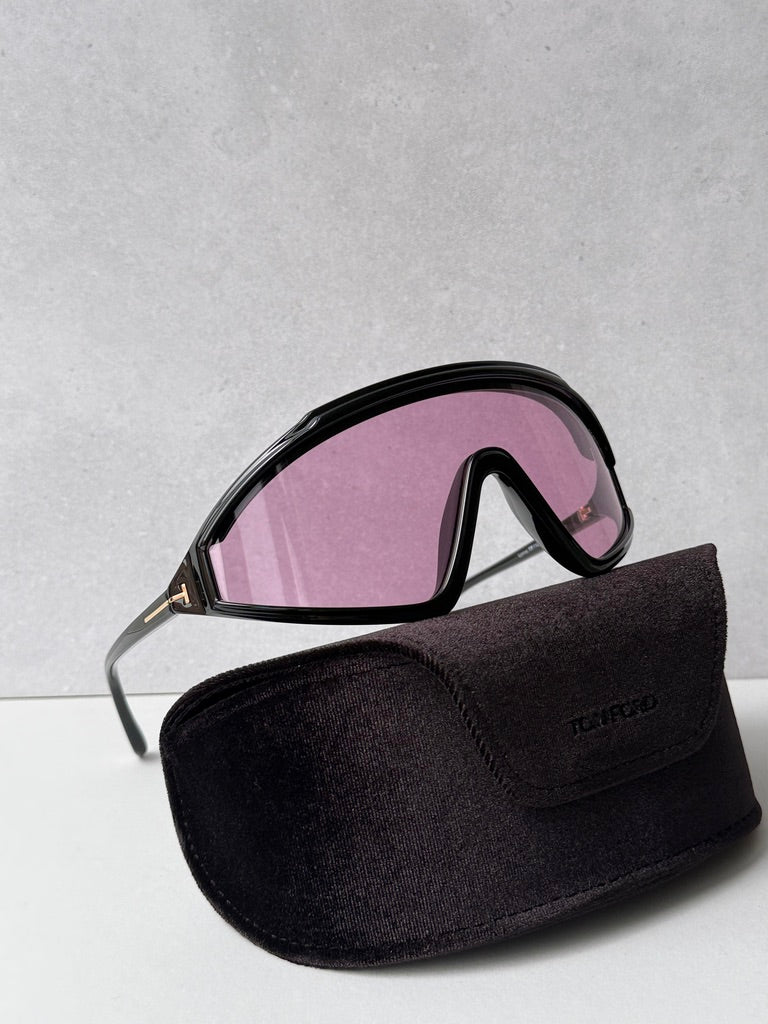 Black sunglasses with pink-tinted lenses and black protective pouch