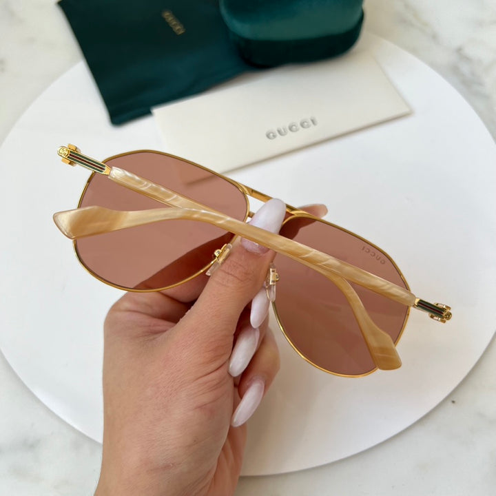 Gucci GG1220S Gold Pink Lens Aviator Sunglasses