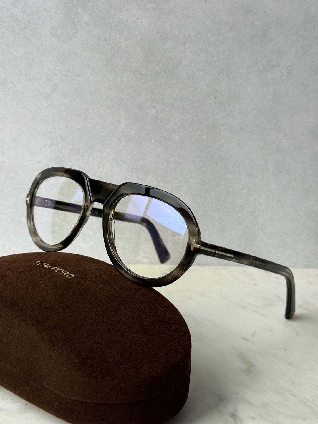 Dark Havana blue-light eyeglass frames, side view, clear lenses and metal arms
