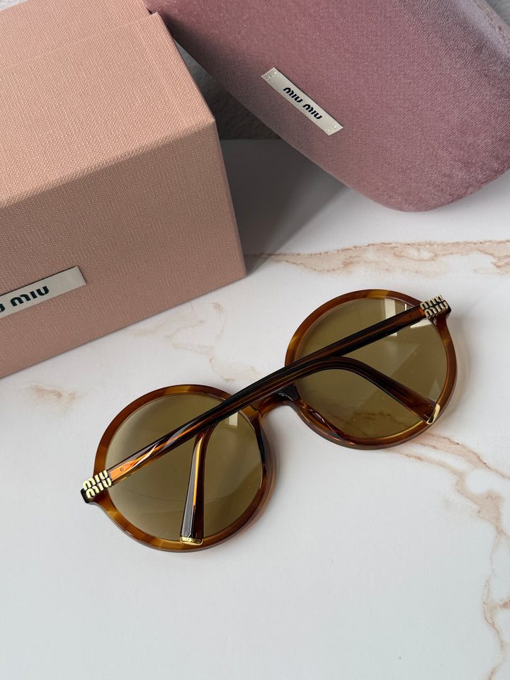 Miu Miu round sunglasses, brown tortoiseshell frames, gold-tone stud hinges