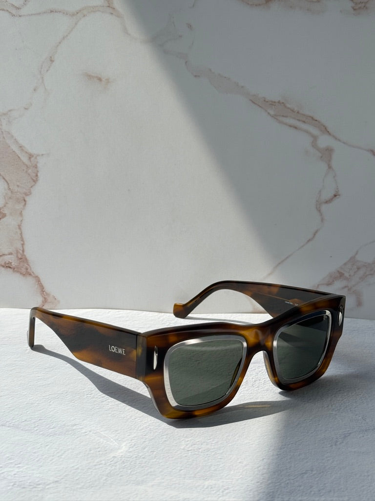 LOEWE sunglasses shown from the opposite side, with square lenses and brown frames