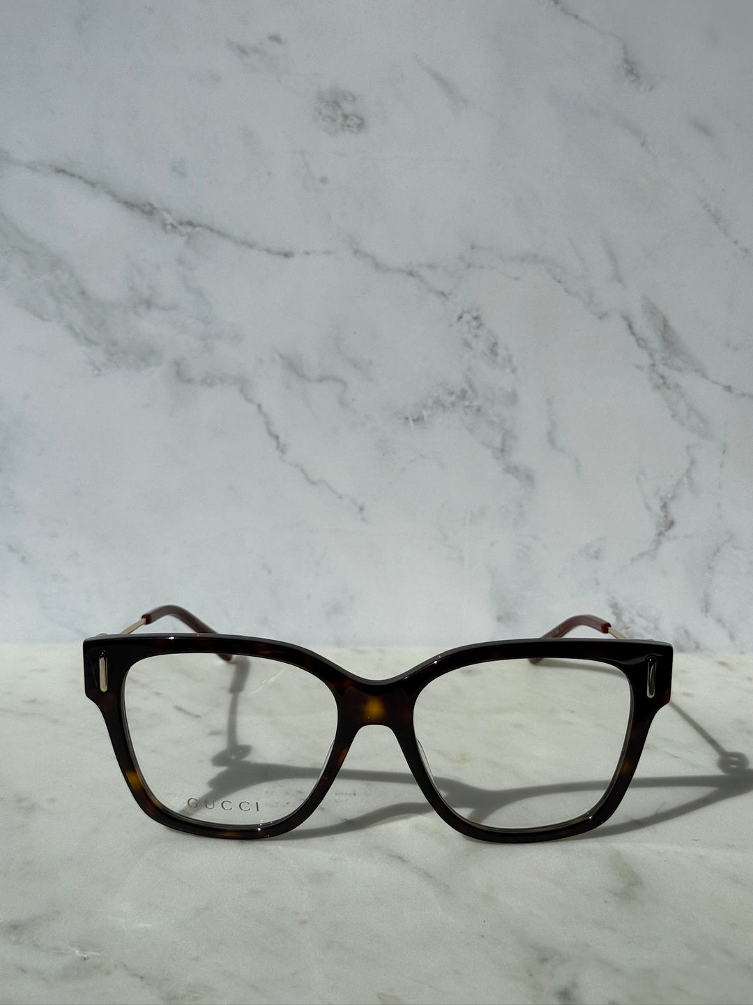 Gucci Havana brown eyeglasses, front view with clear lenses