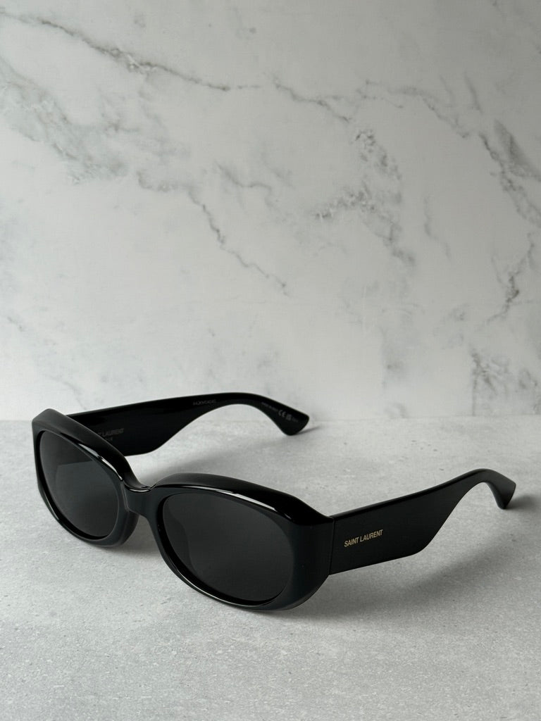 Black rounded sunglasses with dark lenses and logo on temple