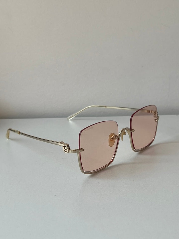 Gafas de sol cuadradas sin montura en dorado Gucci GG1279S