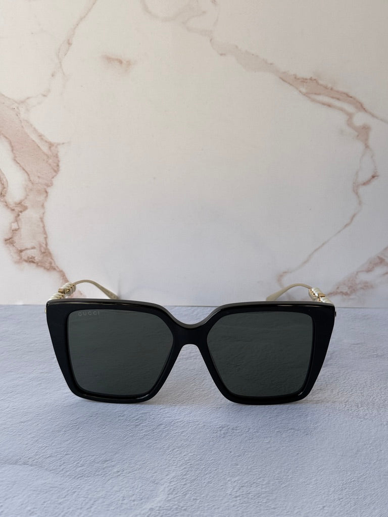 Gucci GG1257S Gafas de sol redondeadas con lentes marrones y rojos