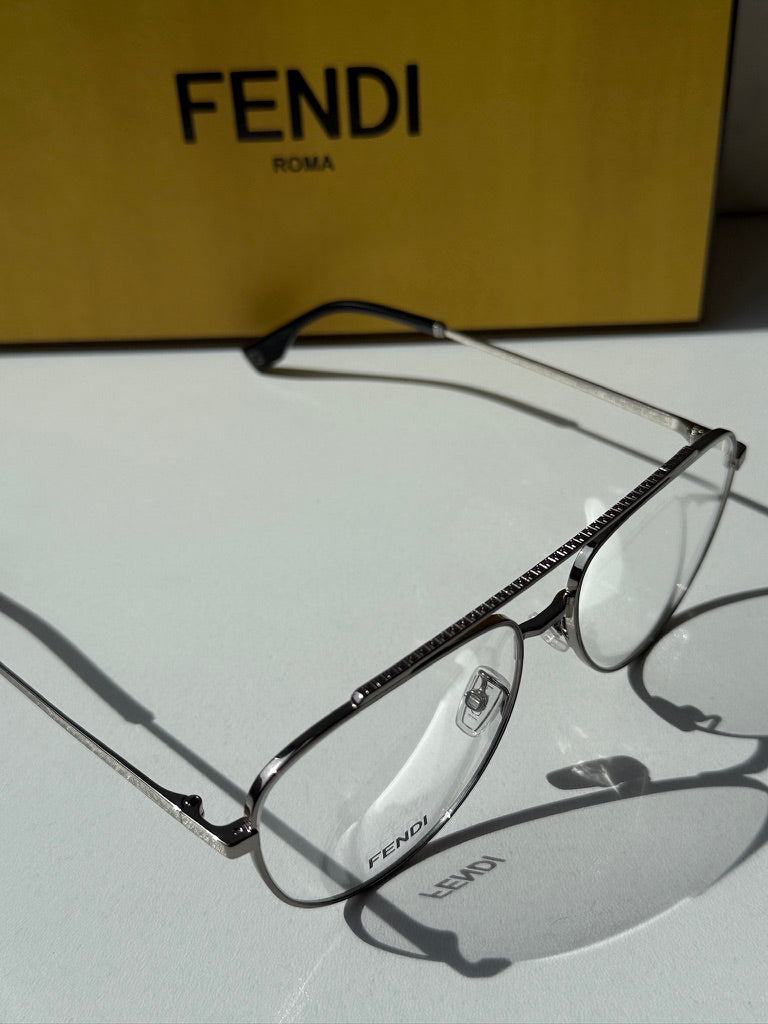 Pilot aviator eyeglasses with metallic frame, clear lenses, and Fendi logo