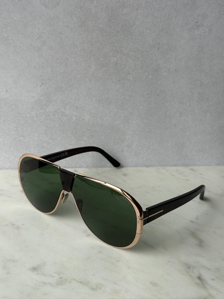 Gold aviator sunglasses with green lenses and black temple tips, angled view, Vincenzo