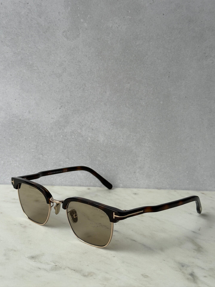 Dark Havana brown sunglasses with brown tinted lenses and slim rectangular frame