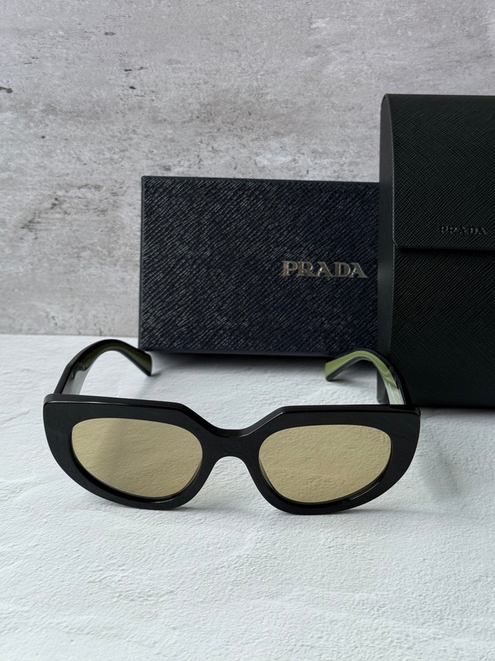 Prada PR D02S Cat Eye Sunglasses in Black Yellow