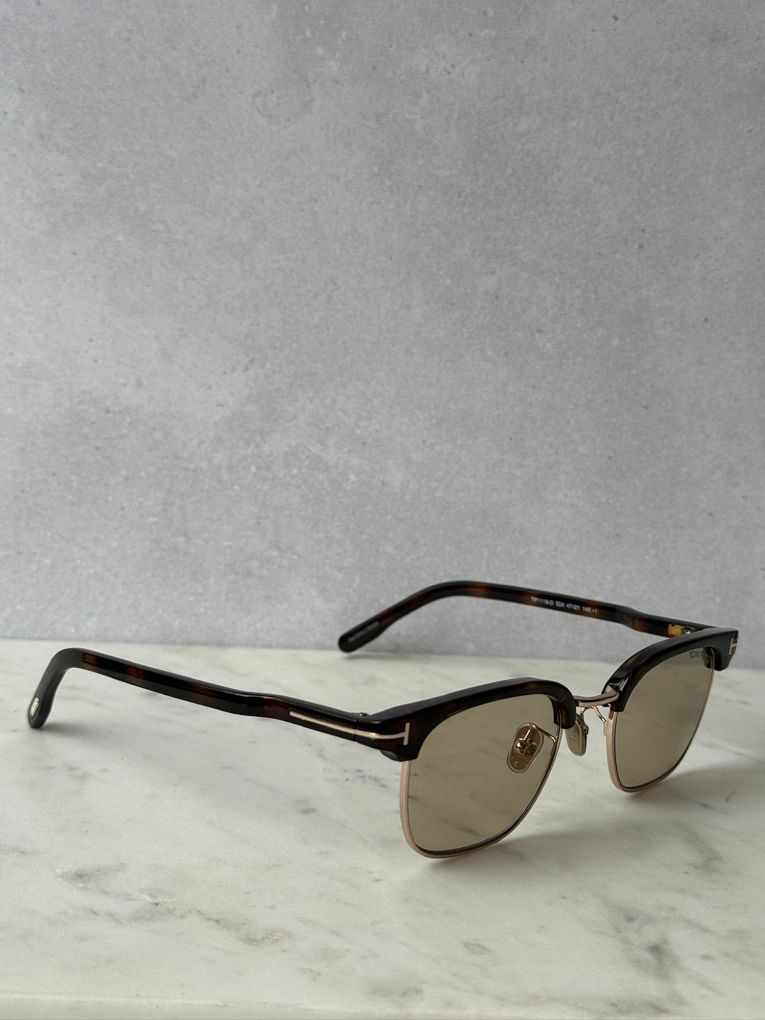 Dark Havana brown sunglasses angled view with brown tinted lenses and gold hinges
