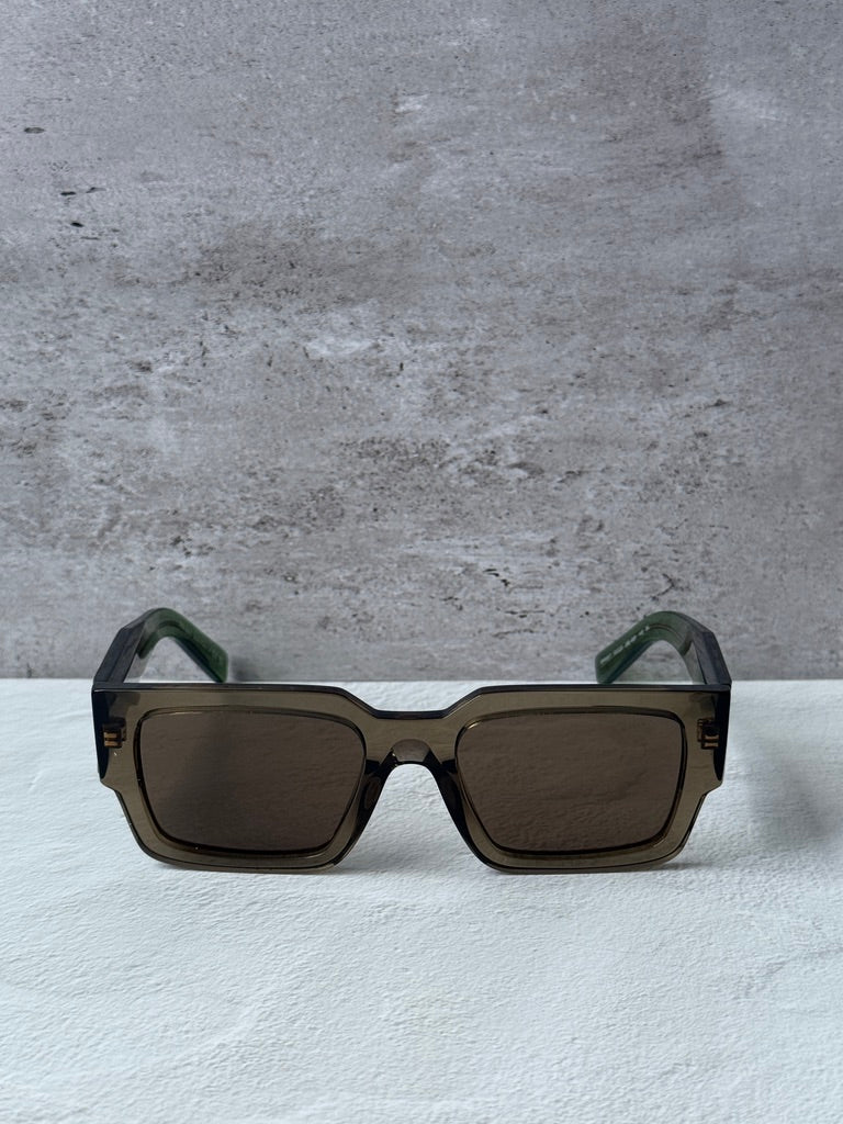 Prada square sunglasses with transparent brown frames and dark brown lenses