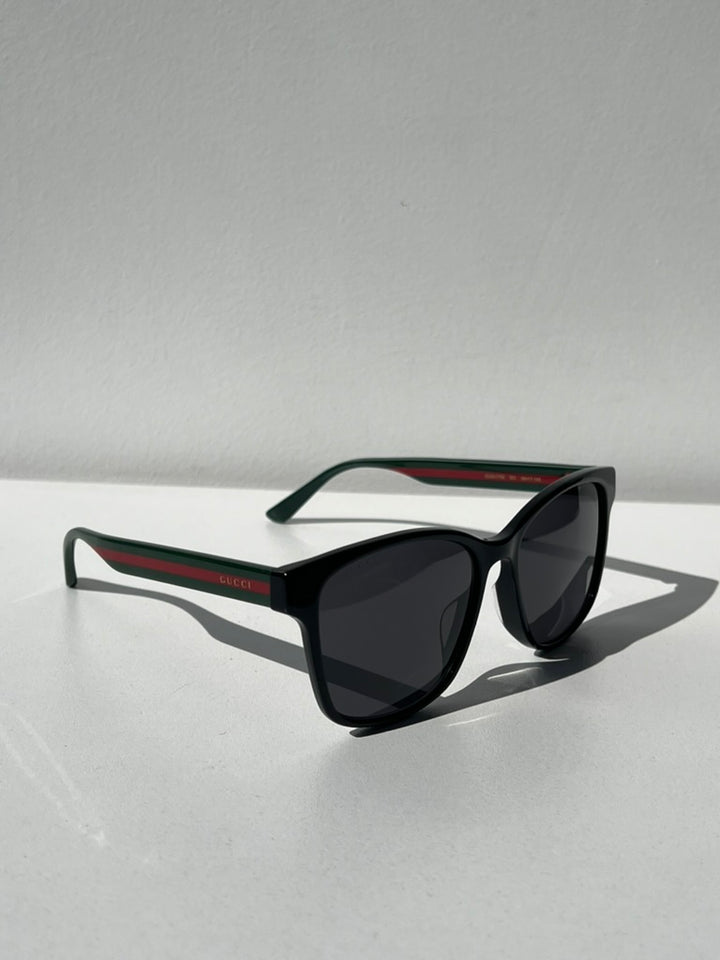 Gucci GG0417SK Gafas de sol con patas a rayas negras