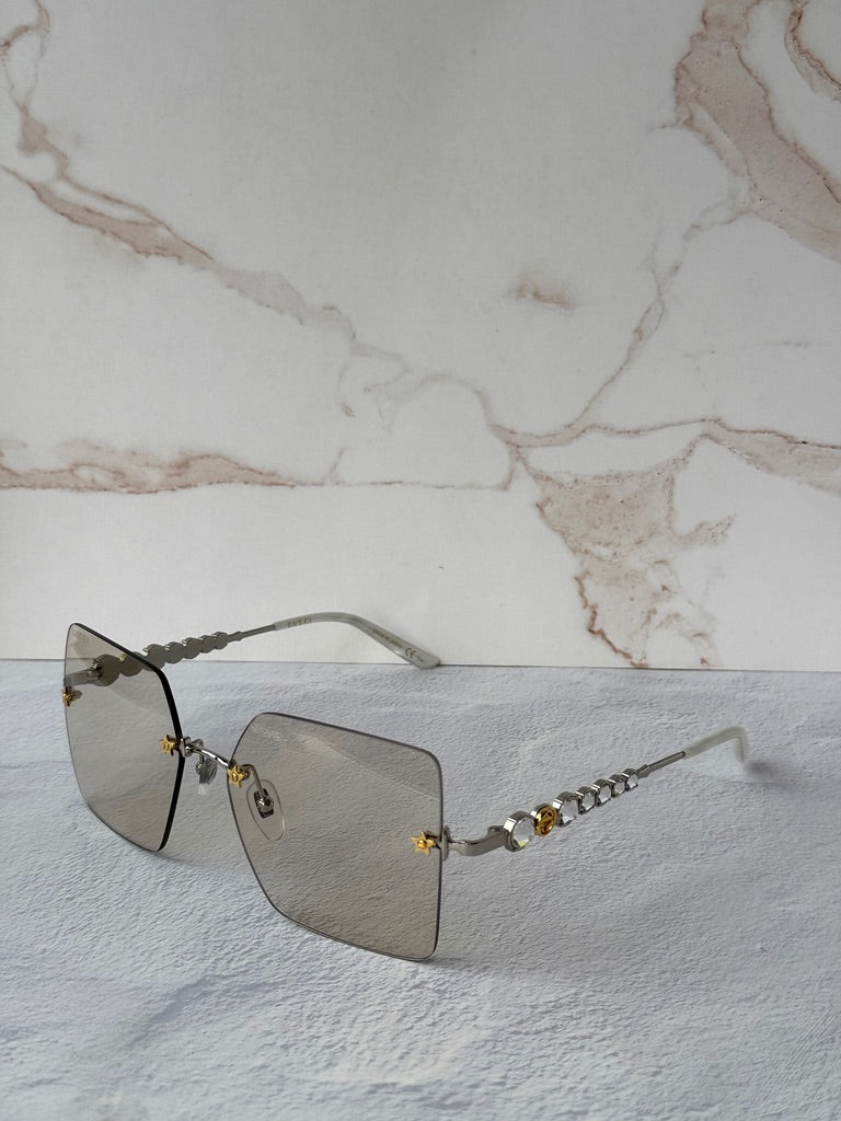 Gucci GG0644S Silver Rimless Star Lens Crystal Sunglasses