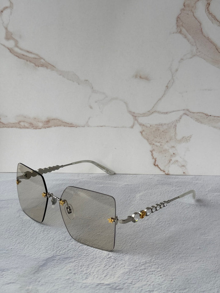 Gucci GG0644S Silver Rimless Star Lens Crystal Sunglasses
