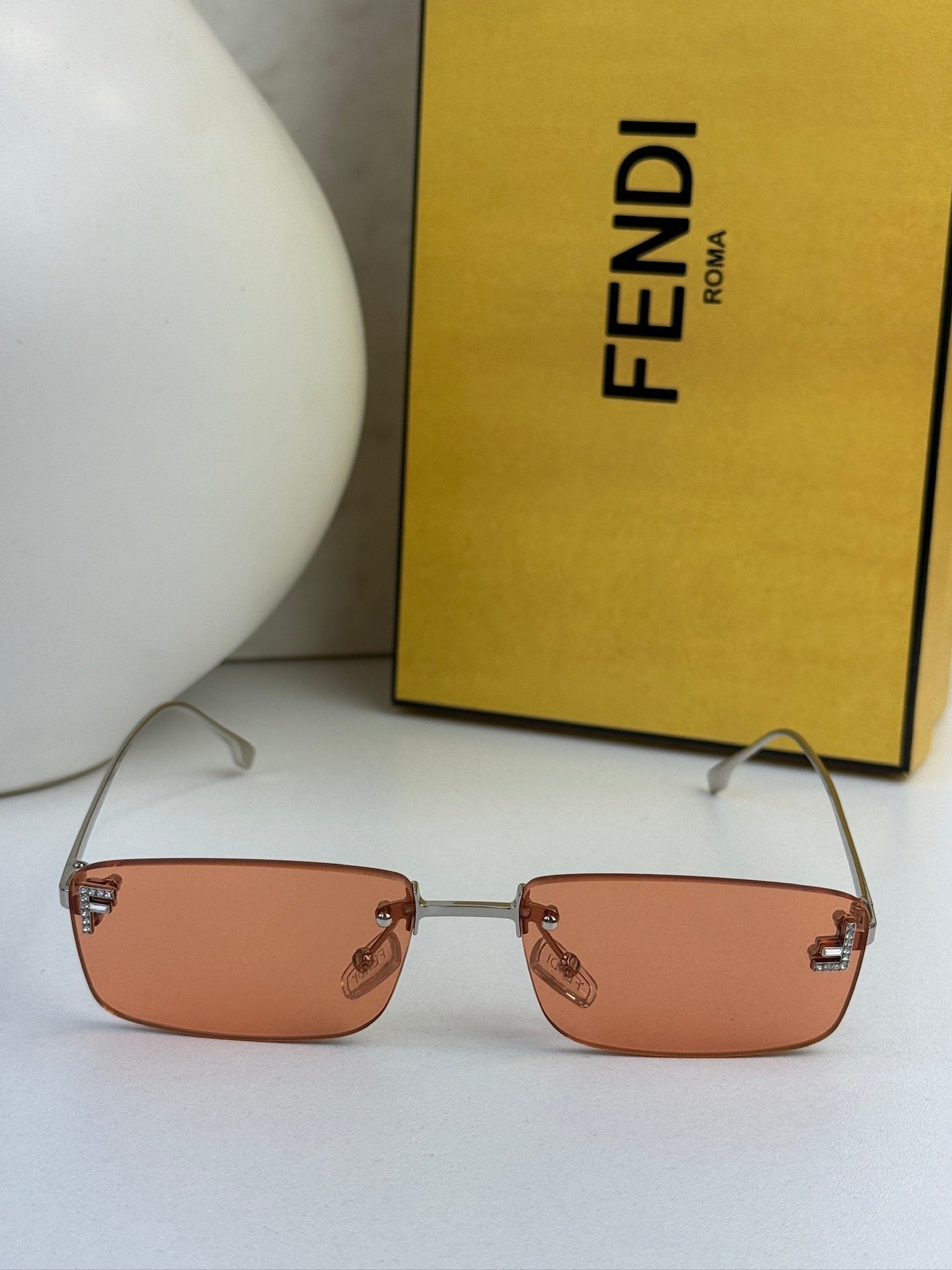 Fendi First FE4172US Rimless Sunglasses in Orange | Designer Daydream