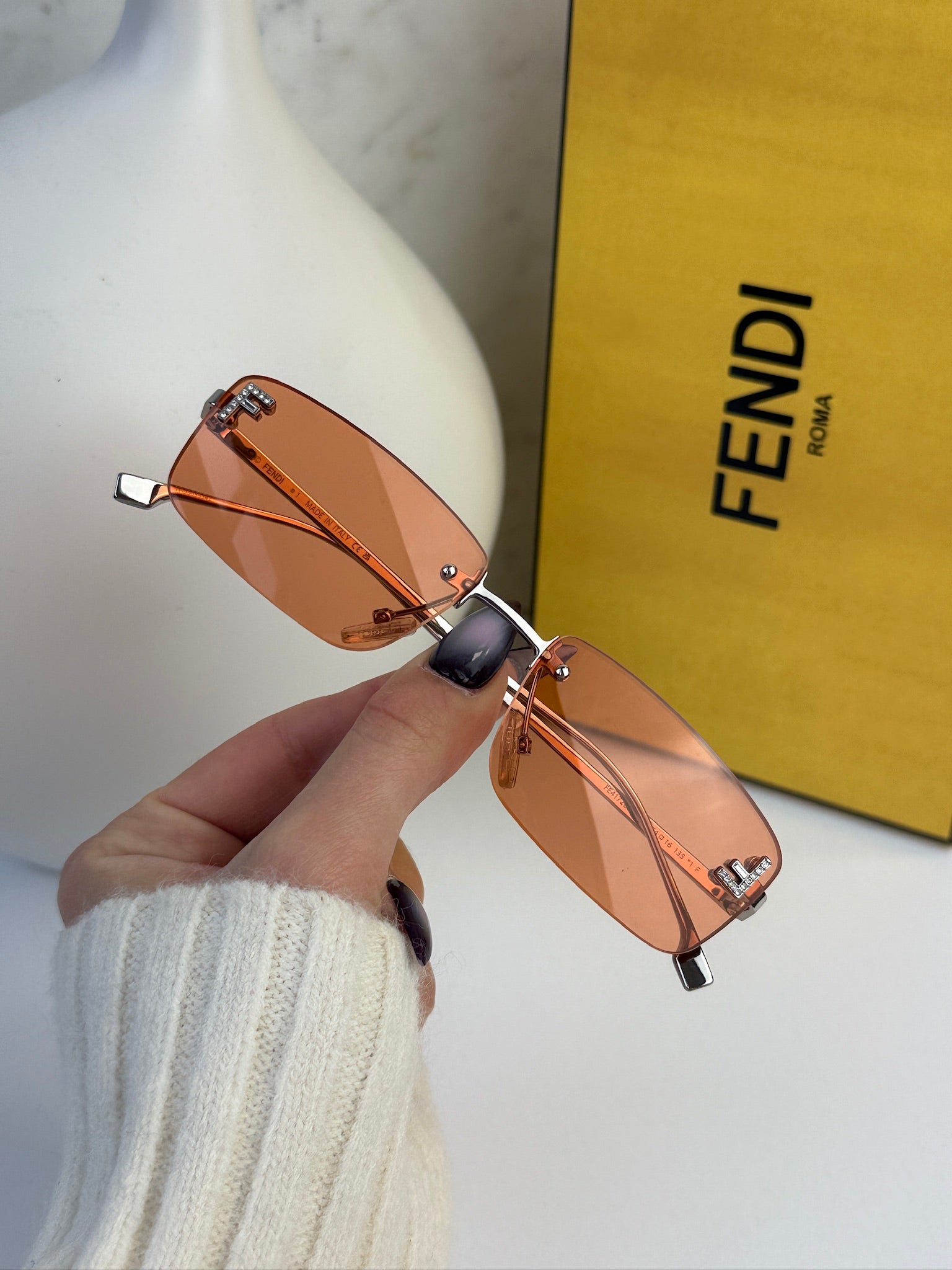 Fendi First FE4172US Rimless Sunglasses in Orange | Designer Daydream