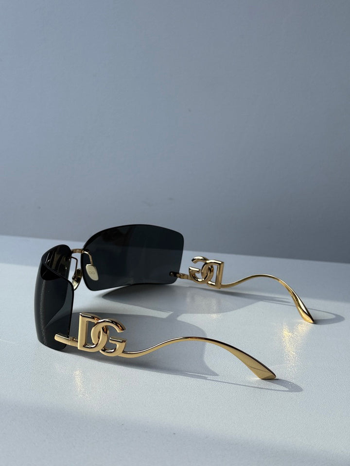 Dolce &amp; Gabbana DG2298B Gafas de sol con escudo negro cristalino 