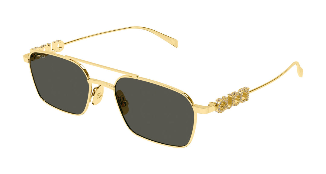 Gold metal sunglasses with dark lenses and crystal GG temple detail