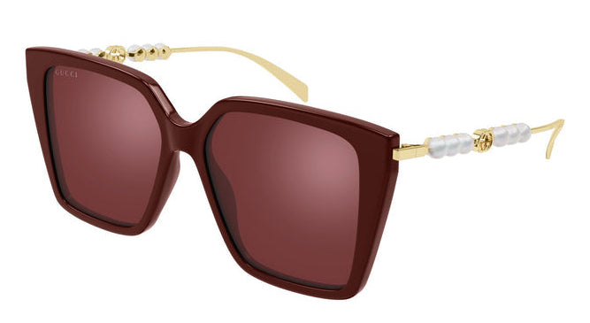Gucci GG1257S Gafas de sol redondeadas con lentes marrones y rojos