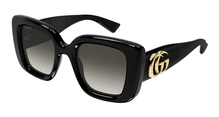 Gucci GG1975S thick-rim cat-eye sunglasses in black with gray lenses and gold GG logo