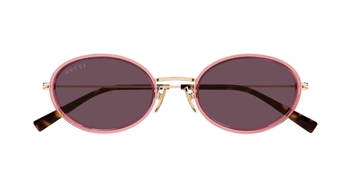 Gucci oval pink sunglasses with dark lenses, gold frame, and tortoise-pattern arms