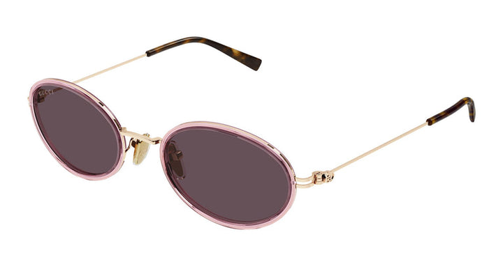 Gucci oval pink sunglasses with dark lenses and gold bridge; tortoise-pattern arms