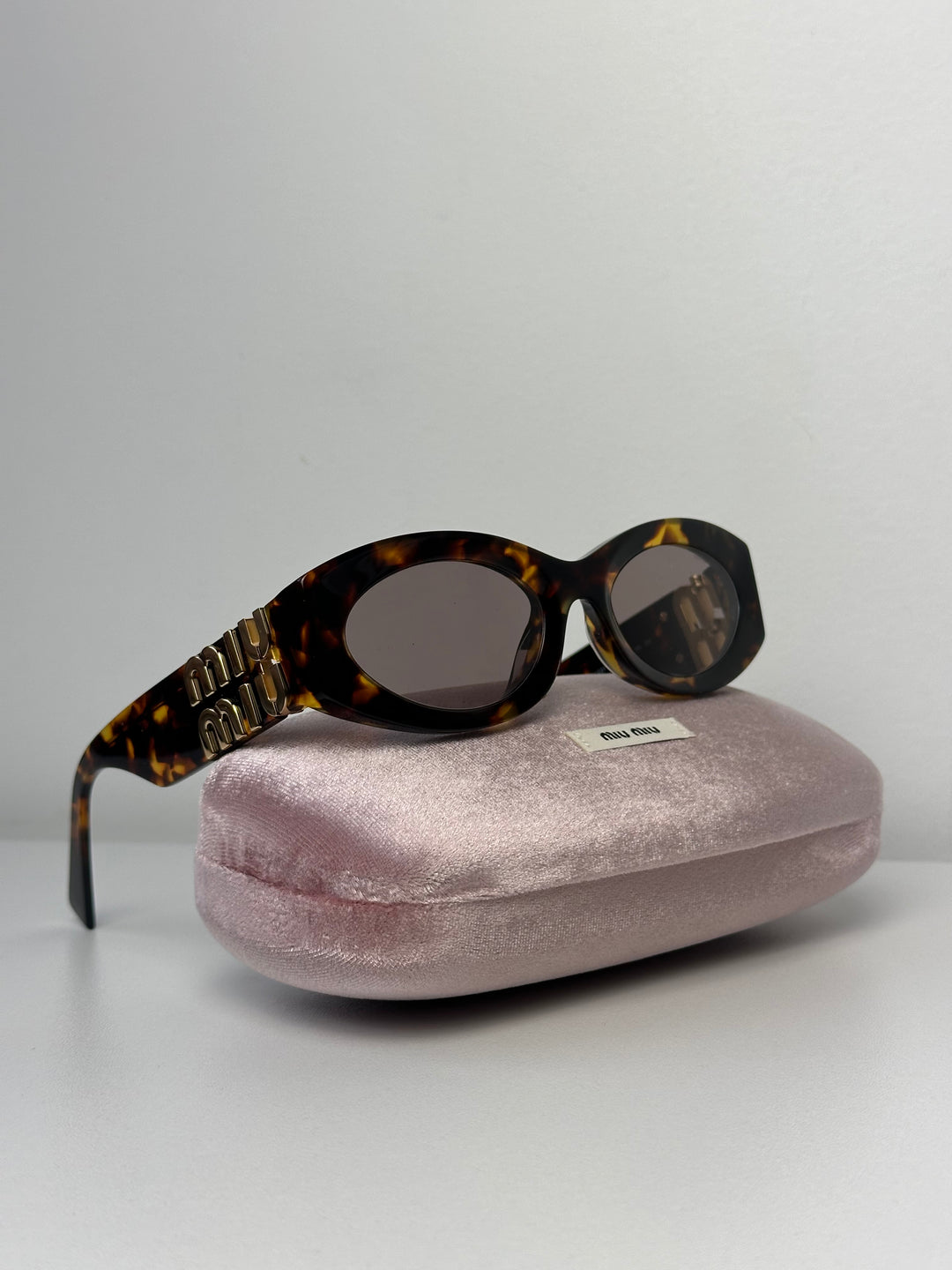 Miu Miu MU11WS Honey Havana Oval Sunglasses